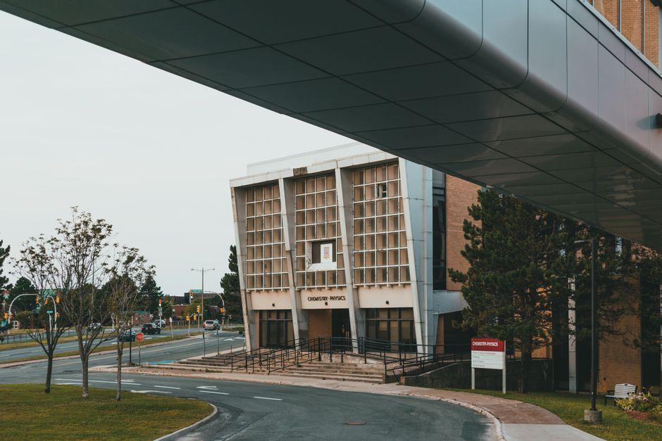 A Building Entrance with Steps near Road